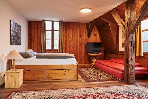 Postel nebo postele na pokoji v ubytování Ferienhaus nahe Schlosshotel Wendorf Golf