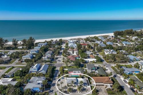 an aerial view of a resort with the beach at Surf Riders home in Holmes Beach
