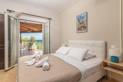 Katil atau katil-katil dalam bilik di Royal Sea View Villa