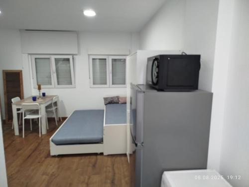TV a/nebo společenská místnost v ubytování Casa de Alexandra 1