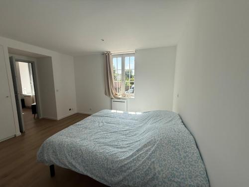 Ένα ή περισσότερα κρεβάτια σε δωμάτιο στο Appartement T2 Neuf Pont-Réan