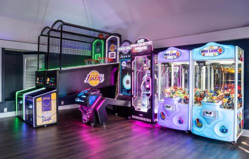 a group of arcade games in a room at Coastal Charm with Canal Views - 419 Tarpon Blvd, Fripp Island in Fripp Island