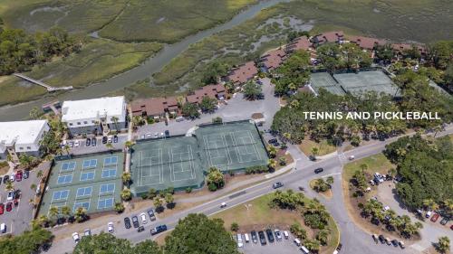 an overhead view of a building with a parking lot at Coastal Charm with Canal Views - 419 Tarpon Blvd, Fripp Island in Fripp Island