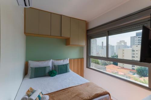 Una cama o camas en una habitación de Studio Novo com Academia em Perdizes - Allianz 5min a pé