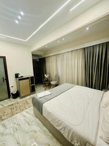 Ένα ή περισσότερα κρεβάτια σε δωμάτιο στο Hermes Pyramids View Hotel