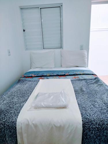 Postel nebo postele na pokoji v ubytování Pousada minha casa ouro verde
