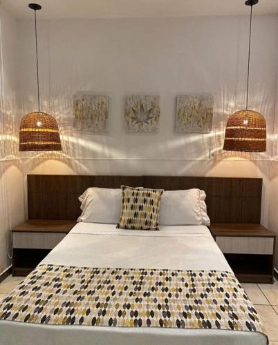Postel nebo postele na pokoji v ubytování Hotel Zensi 420