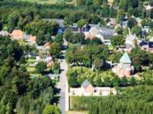 an aerial view of a small town with trees and houses at 5 person holiday home in Hovborg-By Traum in Hovborg