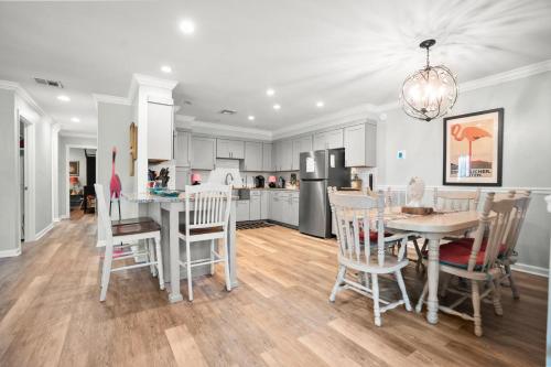 a kitchen and dining room with a table and chairs at Distinctive Island Living - 835 Bonito Rd, Fripp Island in Fripp Island