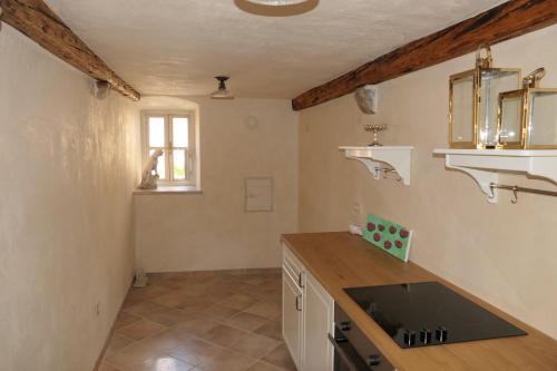 a kitchen with a sink and a counter top at Holiday house with a parking space Senj - 24830 in Senj