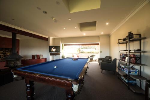 a living room with a pool table in it at Eagle View Escape in Rydal