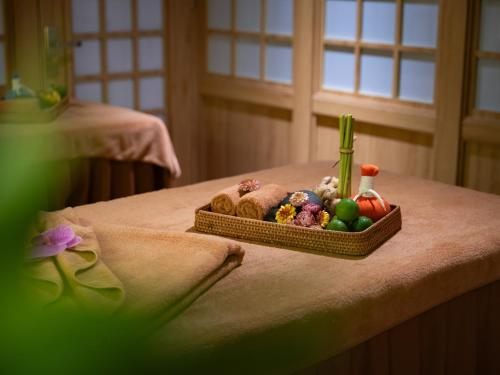 a tray of food sitting on top of a table at Splendid Secret Hotel in Hanoi