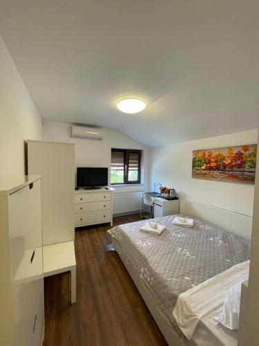 Ένα ή περισσότερα κρεβάτια σε δωμάτιο στο Marisah Residence #11