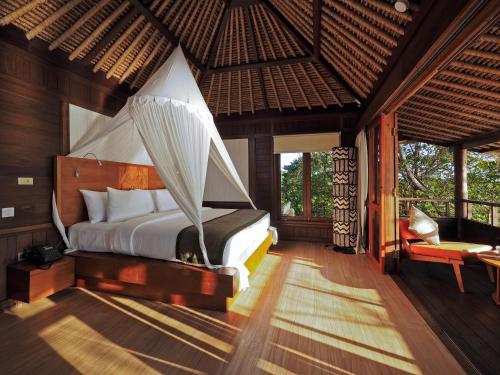 The Menjangan by LifestyleRetreatsにあるベッド