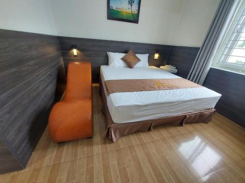 Katil atau katil-katil dalam bilik di Khách sạn Long An - HOTEL