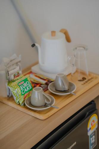 Příslušenství pro přípravu čaje a kávy v ubytování Arabica Khaokho