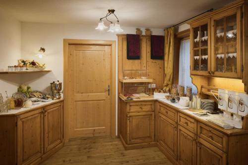 Kuchyň nebo kuchyňský kout v ubytování Residence Rosarela