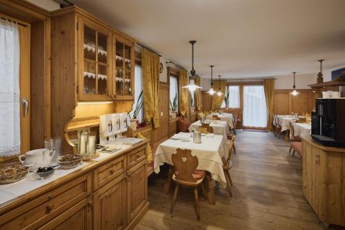 Kuchyň nebo kuchyňský kout v ubytování Residence Rosarela