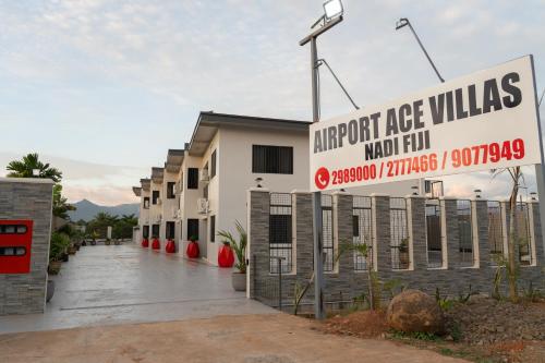 a building with a sign that reads airport ace villas at Airport Ace Villas in Nadi