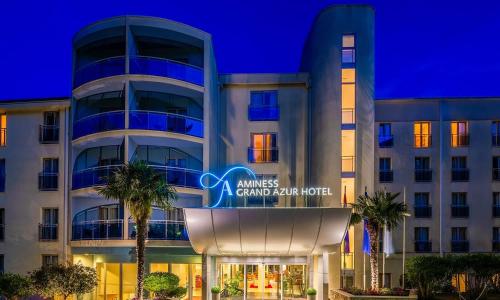 a rendering of a grand hotel at night at Aminess Vival Grand Azur Hotel in Orebić