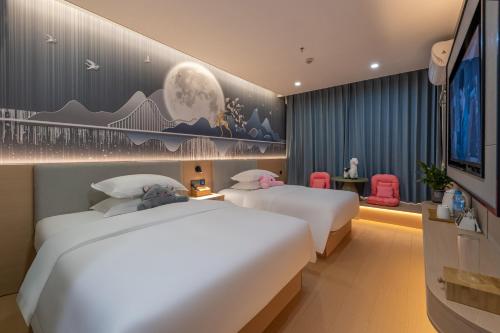 Katil atau katil-katil dalam bilik di Guilin Shanshui Yao-peak season hotel