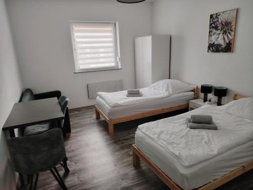 Ένα ή περισσότερα κρεβάτια σε δωμάτιο στο 3 Zimmer Wohnung in Altendorf