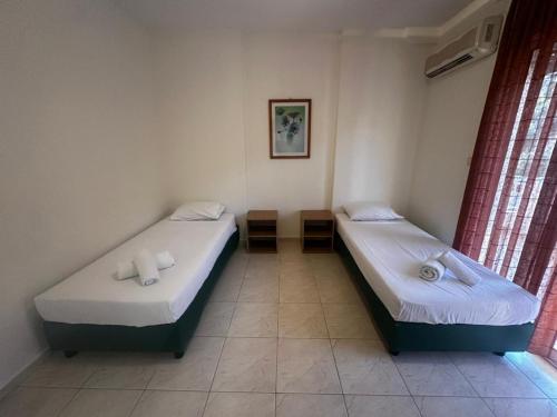 Ένα ή περισσότερα κρεβάτια σε δωμάτιο στο Fenix Apartments