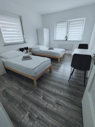 Ένα ή περισσότερα κρεβάτια σε δωμάτιο στο 3 Zimmer Wohnung in Altendorf