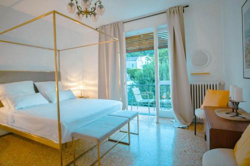 Кровать или кровати в номере LA LIMONAIA Vista Lago