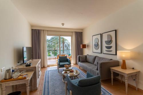Ein Sitzbereich in der Unterkunft Baron Palms Adults Friendly Only 16 years plus Boutique Hotel Style