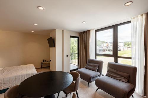 Posezení v ubytování HVOYA Apart-Hotel & SPA