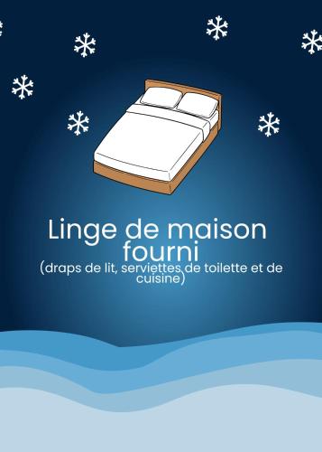 a bed with white sheets on a blue background at Spacieux Appartement avec Parking à Auxerre in Auxerre