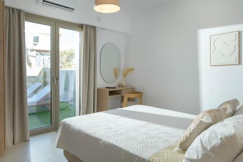 Ένα ή περισσότερα κρεβάτια σε δωμάτιο στο Lumina Sense Villas