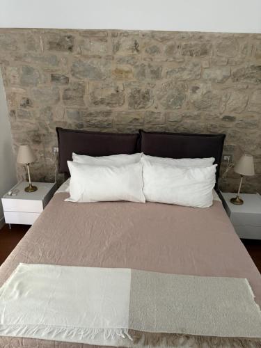 Ένα ή περισσότερα κρεβάτια σε δωμάτιο στο Locanda di Ody