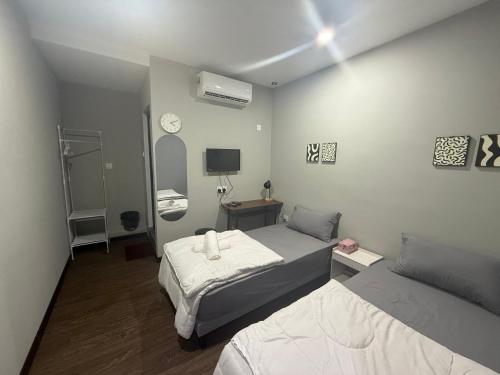 Ένα ή περισσότερα κρεβάτια σε δωμάτιο στο Ab rich Amore Hotel
