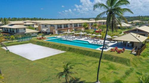 Bazén v ubytování Condominio Frente Mar 3 suites com Ar Cond piscina e Hidro privativa nebo v jeho okolí