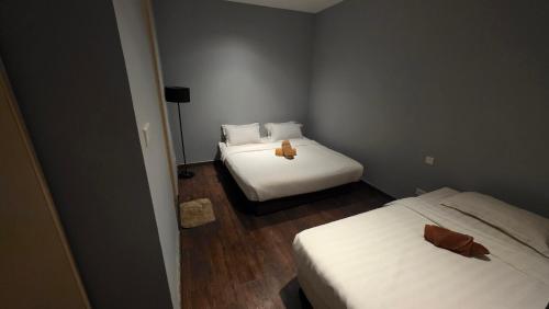 Ένα ή περισσότερα κρεβάτια σε δωμάτιο στο My Misto Homestay, Riverson Soho