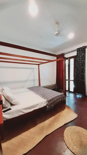 Postel nebo postele na pokoji v ubytování Teli Home Stay