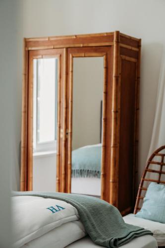 Ένα ή περισσότερα κρεβάτια σε δωμάτιο στο Villa Hygiea - Boutiqueapartments am Wörthersee