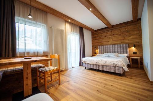 Ein Bett oder Betten in einem Zimmer der Unterkunft B&B Bucaneve