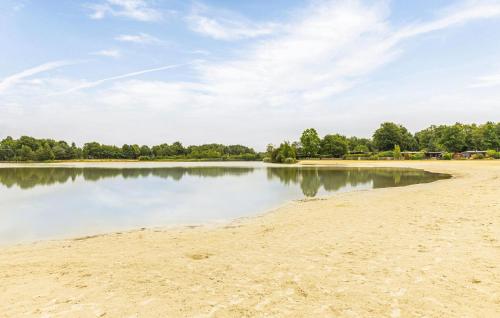 a view of a lake with trees in the background at 2 Bedroom Beautiful Home In Erm in Erm