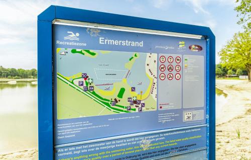 a sign in a park with a map at 2 Bedroom Beautiful Home In Erm in Erm