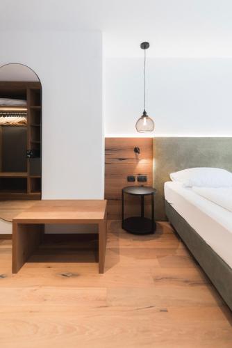 Postel nebo postele na pokoji v ubytování Hotel Erica
