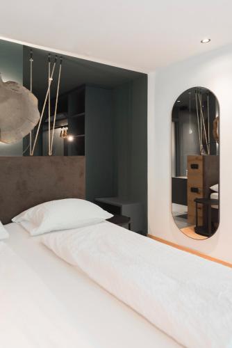 Postel nebo postele na pokoji v ubytování Hotel Erica