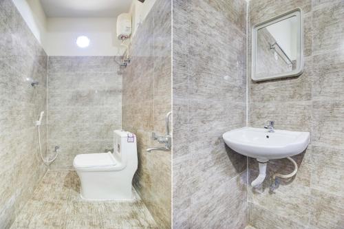 Koupelna v ubytování Hotel O Raga Stays
