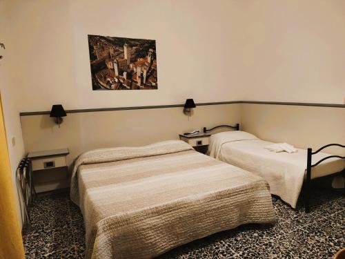 Katil atau katil-katil dalam bilik di Hotel Ai Tufi