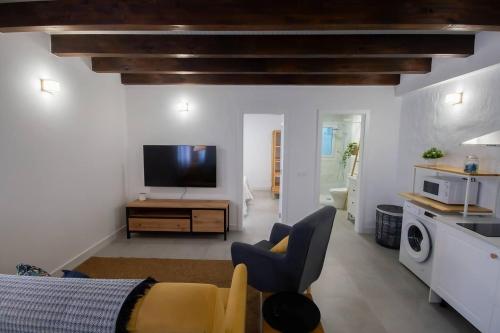 Η κουζίνα ή μικρή κουζίνα στο Apartamentos Marmolejos