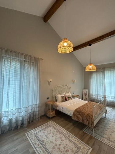 Postel nebo postele na pokoji v ubytování Villa Snowia