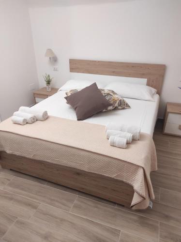 Ένα ή περισσότερα κρεβάτια σε δωμάτιο στο B&B Santa Filomena