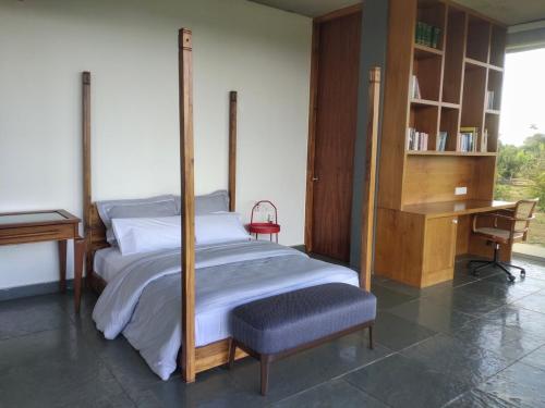 Postel nebo postele na pokoji v ubytování Contemplation Farm stay at Nandi Hills